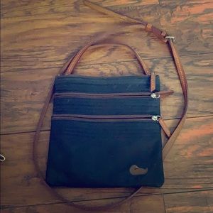 Black crossbody bag, has small scares